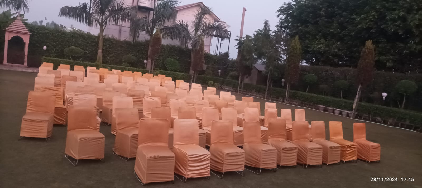 Outdoor Guest Seating Layout with Peach Chair Covers